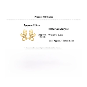 Detail view of 3D gold flower earrings with acrylic texture and precise dimensions