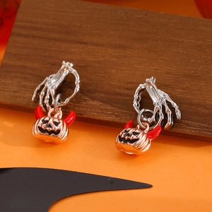 Ghost hand clutching rose gold devil pumpkin earrings for unique Halloween style