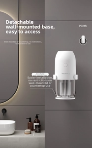 Detail showing the white smart fragrance diffuser with detachable base for wall mounting