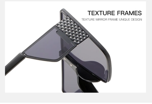 Detail of black square sunglasses featuring intricate woven texture on the frame temples