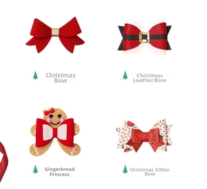 Detailed set of four Christmas bow hair clips featuring Santa and gingerbread man designs