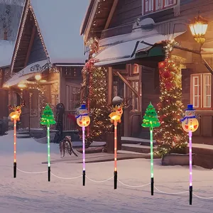 Solar Christmas pathway lights with reindeer, snowman and tree shapes for garden lawn