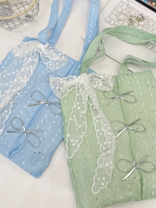 Sparkly sequins tote bag with a white lace bow in light blue and green colors