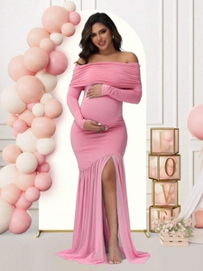 Detail of pink off-shoulder maternity dress with long sleeves and side slit design