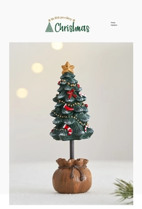 Detailed Christmas tree ornament with golden star, mini socks and burlap base