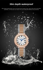 Detailed view of women's steel watch splashing in water to show 30m water resistance