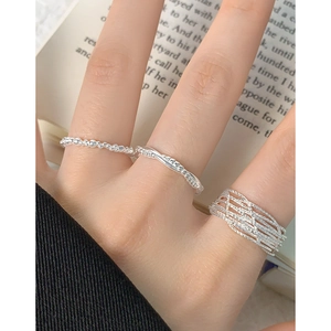 Three-piece silver S925 stacking ring set with beaded and twisted designs for women