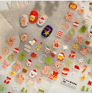 Detailed view of 5D embossed Christmas nail stickers featuring bears and festive patterns