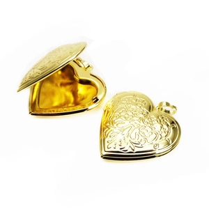 Golden heart locket pendant with floral relief shown open and closed on white background