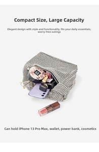 Detail view of silver rhinestone evening bag showing capacity for smartphone and makeup