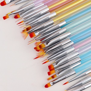 Detail of colorful professional nail art brush set with gradient bristles and silver ferrule