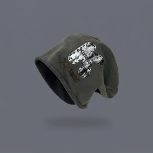 Dark grey-green knit beanie with large letter K patch and studs for casual street style