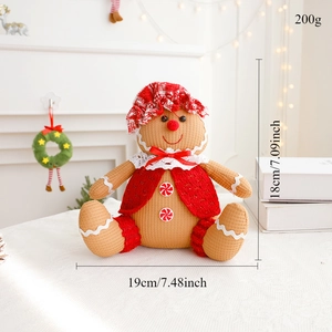 Detail of Christmas gingerbread plush with red vest and size labels 19x18cm