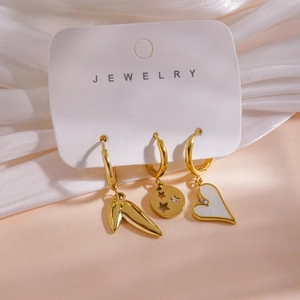 Detailed set of 14K gold-plated stainless steel earrings with shell heart and zircons