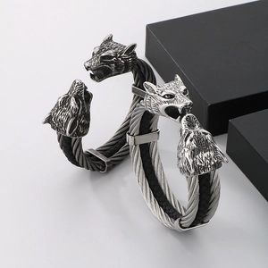 Viking style double wolf head open bangle with braided steel wire and cowhide leather