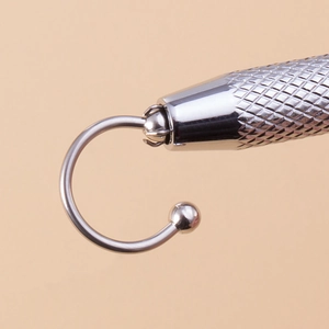 Silver bead grabber piercing tool with knurled handle for belly rings and jewelry