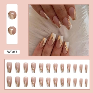 Elegant French press-on nails in nude pink with gold foil accents and ballet shape