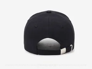Detailed back view of black baseball cap with adjustable silver metal buckle strap