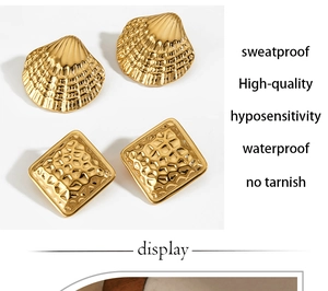 Macro shot of gold-plated square studs and shell earrings with textured metal finish