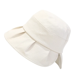 Elegant off-white sun hat for women with wavy brim and minimalist foldable cotton texture