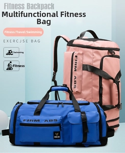 Detail view of large capacity fitness bag in pink and blue with waterproof nylon texture
