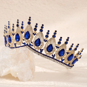 Luxurious Baroque gold bridal crown with large blue crystals and rhinestones on stone
