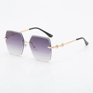 Fashionable rimless oversized square sunglasses with purple gradient lenses and gold temples