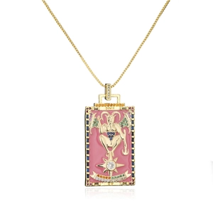 Detailed close-up of tarot card devil pendant with 18K gold plating and colorful zircon gems
