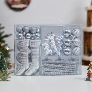 Silver Christmas ornament set with glitter balls, socks, and star in a gift box