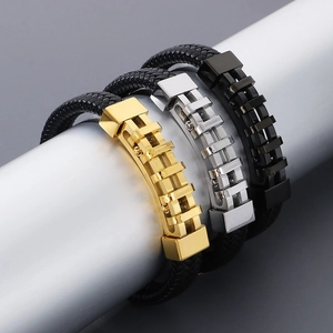 Bracciale da uomo in pelle intrecciata con dettagli in acciaio oro, argento e nero