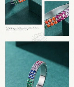 Macro shot of S925 silver rainbow ring featuring three rows of pave-set colorful gemstones