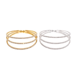 Vintage three-layer rhinestone open bangle in gold and silver finish with geometric details