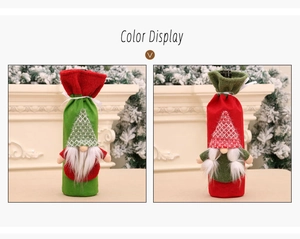 Detail of red and green gnome wine bottle covers with felt hats for Christmas table decor