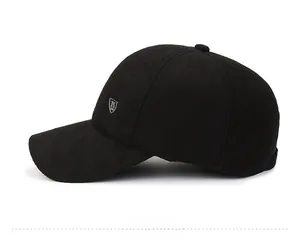 Detailed side view of black baseball cap featuring a premium silver shield metal logo