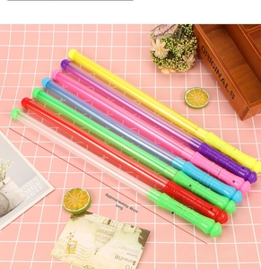 Macro detail of seven colorful LED glow sticks for concerts, 48CM length with switch