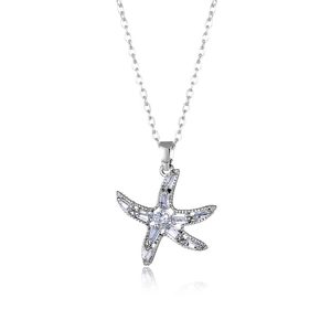 Silver starfish necklace with zircon stones on O-chain over white background with reflection