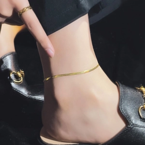 Minimalist gold snake chain anklet for women made of elegant polished titanium steel