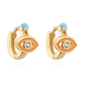 Macro view of gold-plated evil eye hoop earrings with orange enamel and blue bead detail
