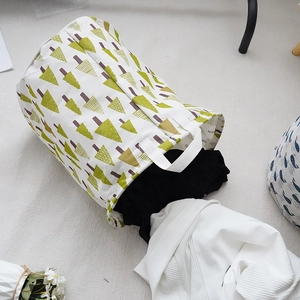 Large foldable cotton linen laundry basket with green tree patterns and durable handles