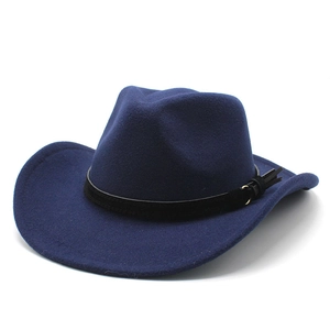 Detail of dark blue wool fedora hat with black suede band and golden hardware accents