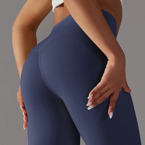 Detailed back view of high-waisted navy yoga pants featuring V-shaped seam for butt-lifting