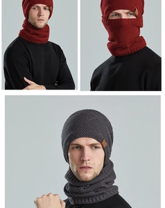 Detail of chunky knit winter set for men including a warm beanie and snood in deep colors