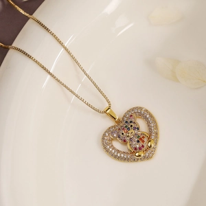 18K gold plated heart necklace featuring a colorful crystal teddy bear pendant