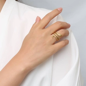 Minimalist gold snake wrap ring in stainless steel with detailed scale texture for women