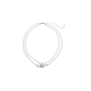 Double-layer pearl necklace featuring a sparkling diamond-set planet Saturn pendant charm