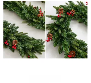 Detailed view of Christmas garland featuring green pine needles, red berries and pine cones