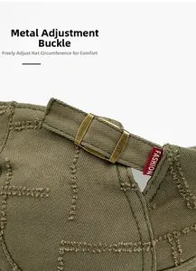 Detail of vintage green cotton cap with brass metal buckle and FASHION woven label