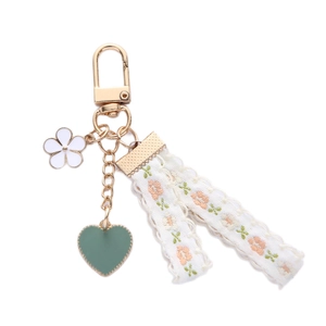 Daisy floral keychain with gold spring clasp, white flower charm and embroidered lace strap