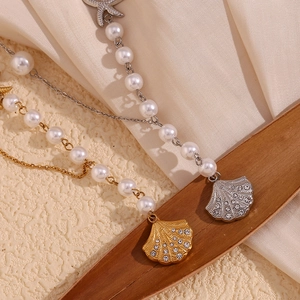 18K gold and silver necklaces with pearls, starfish charms and seashell pendants