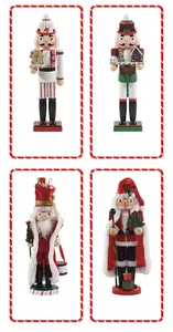 Four 14-inch wooden Nutcracker soldiers with festive gingerbread and candy motifs